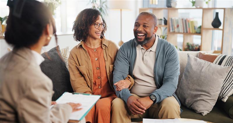 African American couple scheduling a financial check up with their advisor